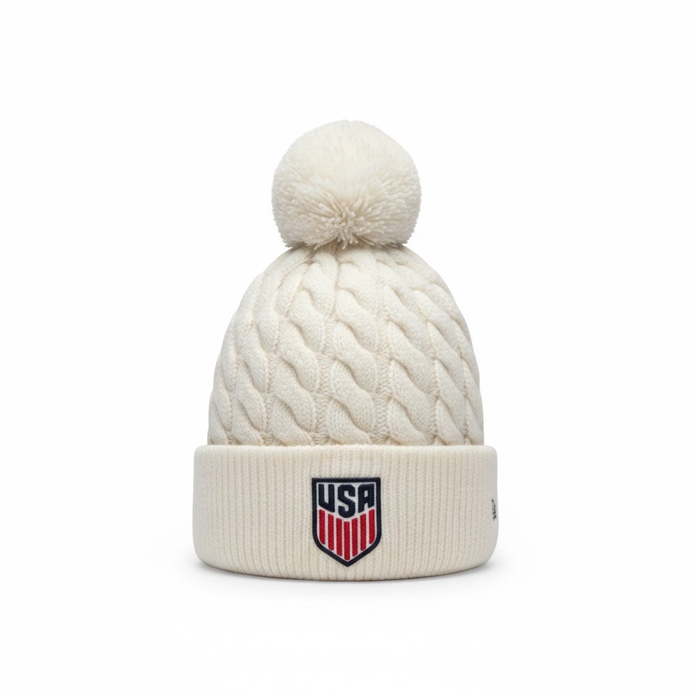 New Era USA Cable Knit Pom Beanie in Cream with Red & Blue Patch